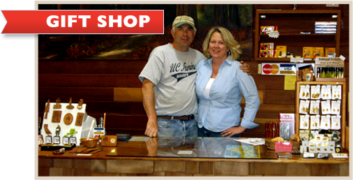 photo of a couple behind gift shop counter